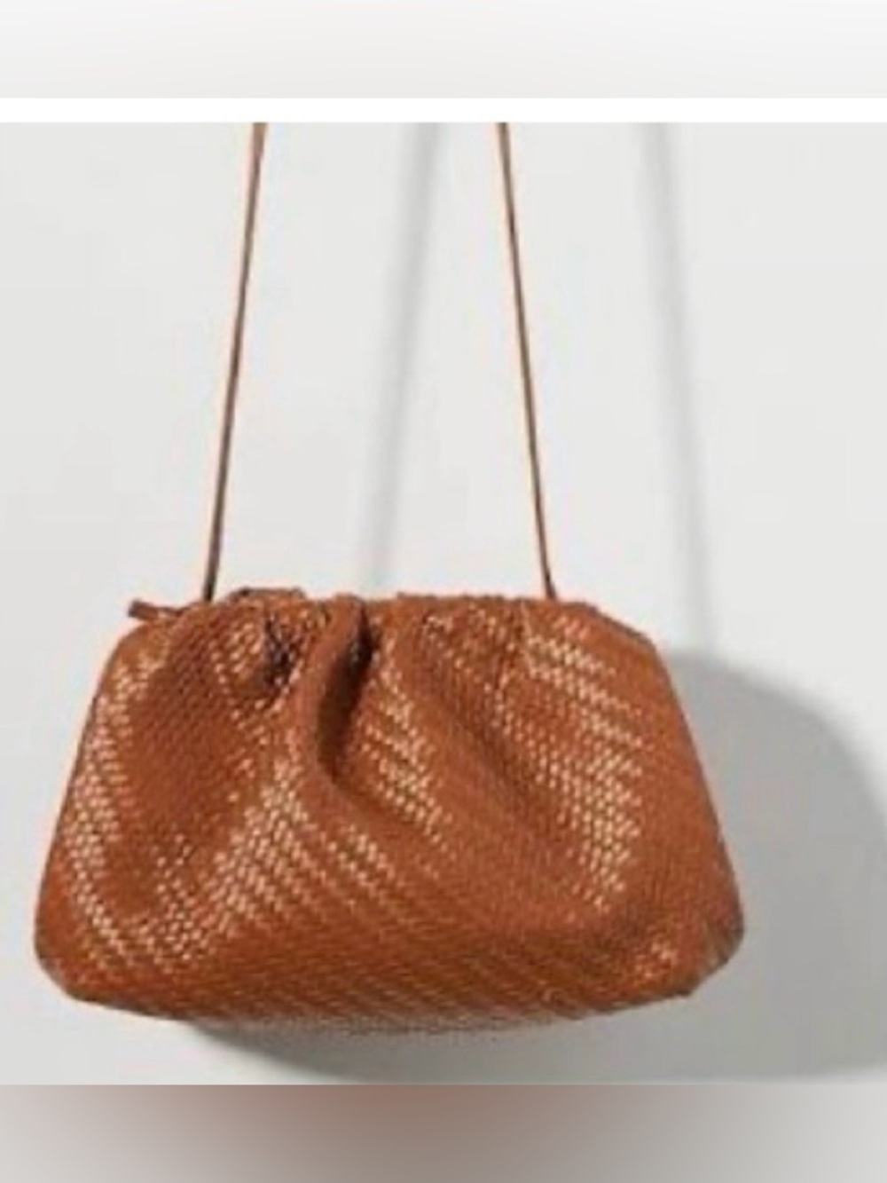 Anthropologie The Frankie Clutch in burnt orange